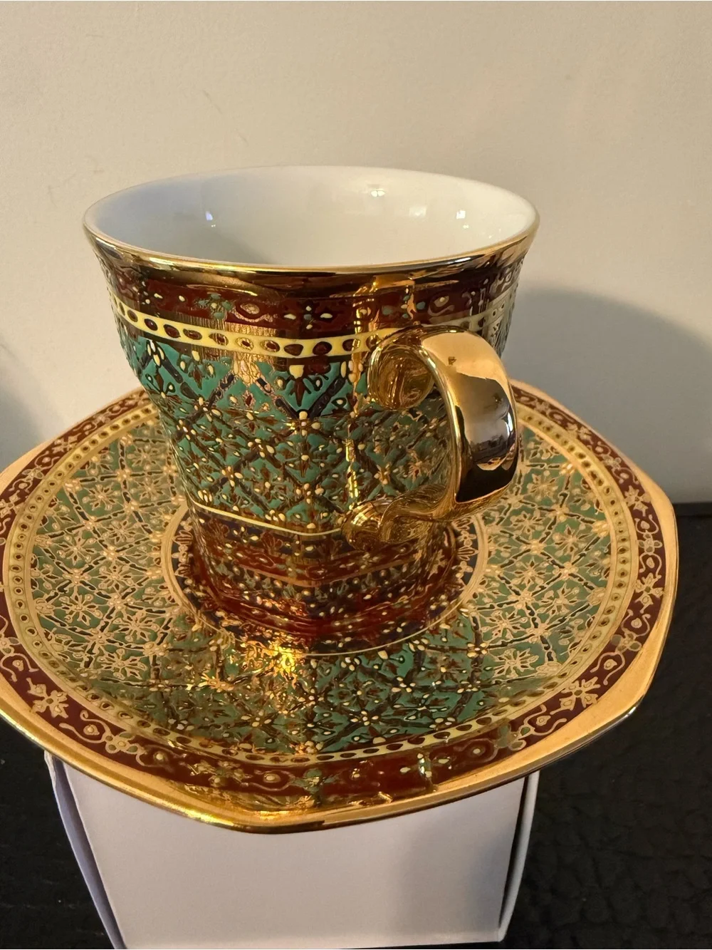 PIPATANA BENJARONG Green red and Gold Porcelain Teacup with Saucer.